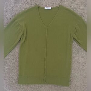 Light green V-neck sweater